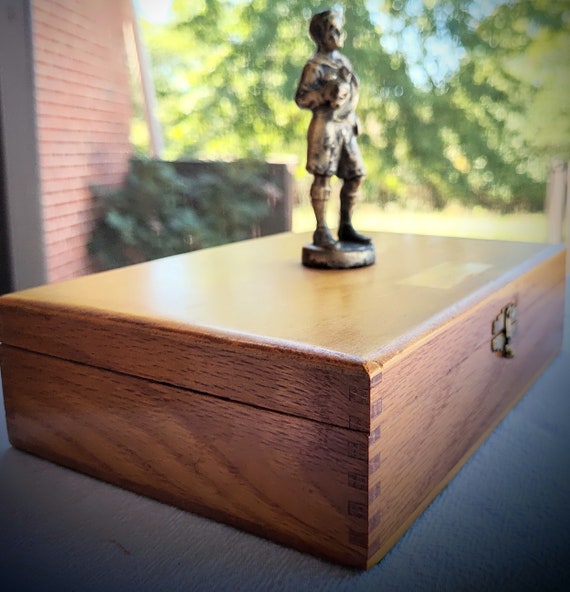 R. Tait McKenzie statue of Boy Scout on wood box.… - image 2