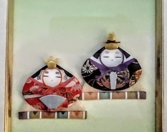 Adorable framed washi paper dolls made in Japan. Free shipping in the continental United States.