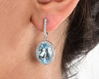 Sky Blue Topaz Sterling Silver Drop Earrings: Oval Dangler Latchbacks
