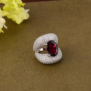 Oval Garnet Sterling Silver Ring: White Topaz Accent
