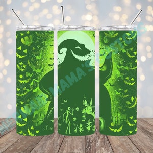 May include: Three green stainless steel tumblers with a green and black silhouette of the Nightmare Before Christmas character, Oogie Boogie, on the center tumbler. The tumblers have a green and black pattern of bats, pumpkins, and spiderwebs.