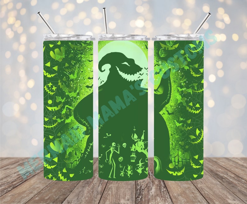 May include: Three green stainless steel tumblers with a green and black silhouette of the Nightmare Before Christmas character, Oogie Boogie, on the center tumbler. The tumblers have a green and black pattern of bats, pumpkins, and spiderwebs.