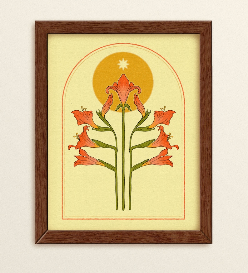 May include: Framed art print featuring a stylized floral design. The artwork showcases orange flowers with green stems against a yellow background, with a sun and star motif. The print is enclosed in a dark brown wooden frame.