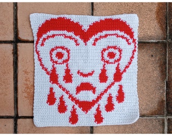 Patrón de tapiz de crochet estilo tatuaje tradicional americano con corazón llorando