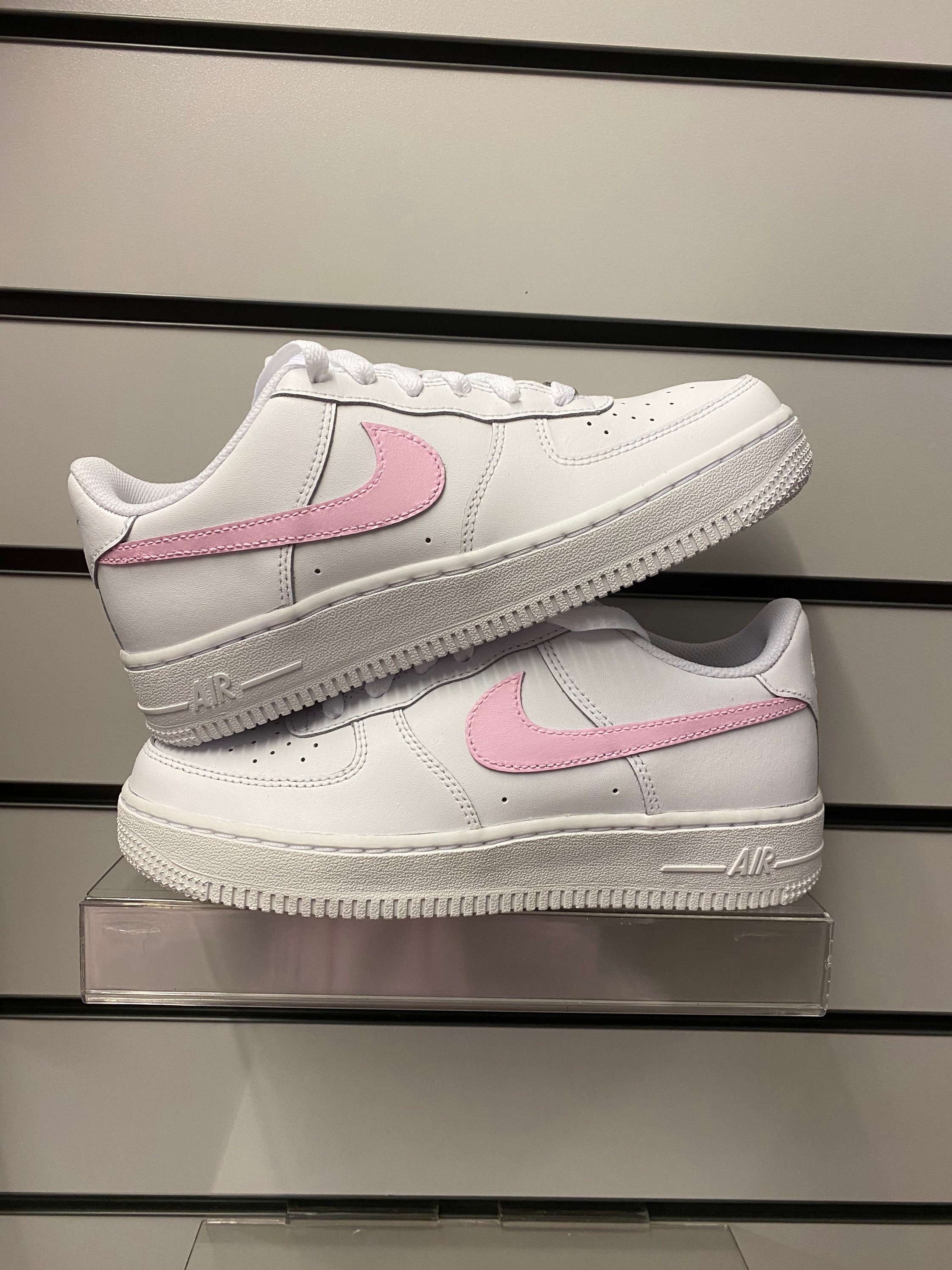Nike Air Force 1 Low WMNS Fire Pink CT4328-101 | SneakerNews.com