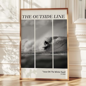 May include: Framed black and white print featuring a surfer riding a wave. The print is divided into three vertical sections. The text "THE OUTSIDE LINE" is at the top, with "Issue 04: The Winter Swell 07/1998" at the bottom.