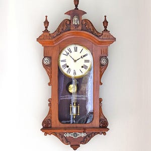 E.N. Welch Renaissance Revival Walnut Wall Clock, 8 Day Spring Driven, Ca 1880, Working, 33"