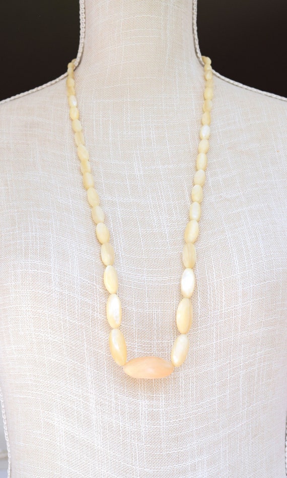 Antique Carved Mother Of Pearl Graduated Oval Bead