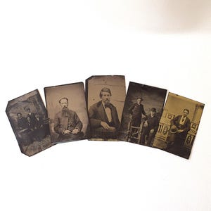 May include: Five antique photographs arranged in a fan shape. The sepia-toned images depict men in formal attire, likely from the 19th century. The photographs vary in size and show signs of age, adding to their vintage appeal.