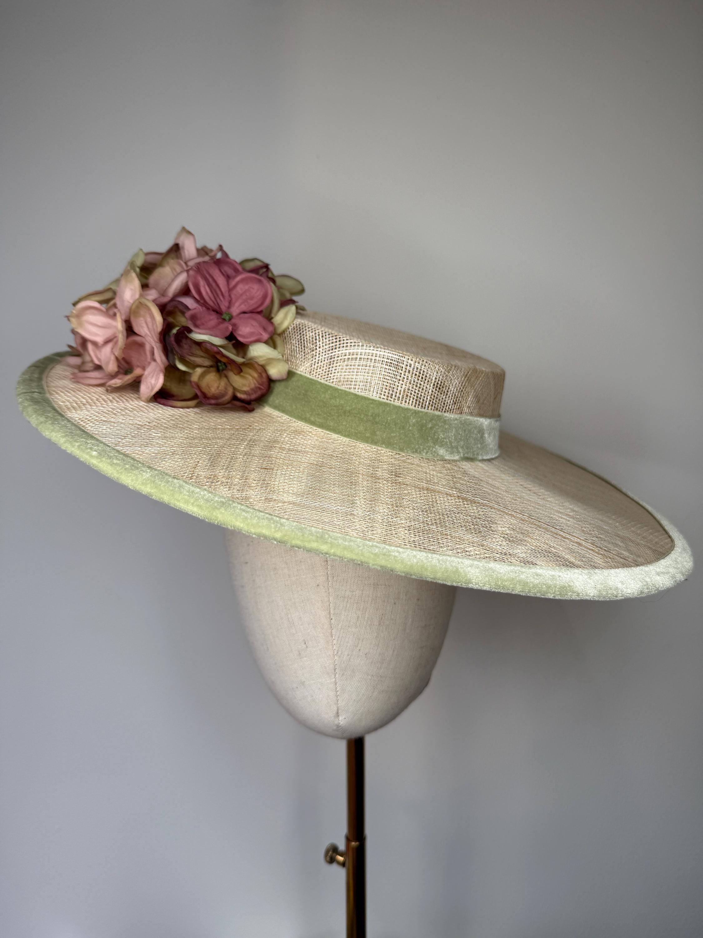 Chic Pastel Green Hat with Pink Floral Accent Pamela Anderson Pairs an Unexpected Hat With the Quirkiest  main image 3
