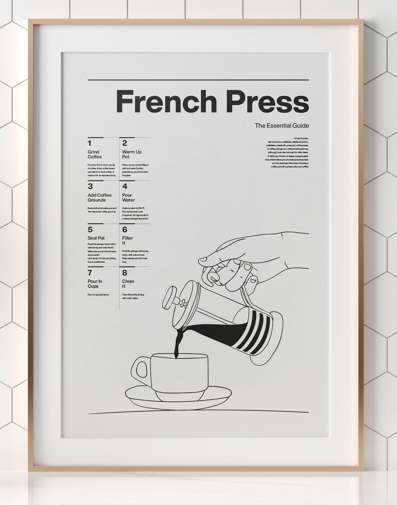 May include: A black and white line drawing illustration of a French press coffee maker with a hand pouring coffee into a cup. The illustration is accompanied by a numbered list of instructions for making French press coffee. The text reads "French Press The Essential Guide".