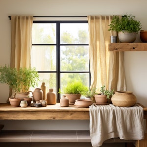 a wooden table topped with potted plants next to a window Natural European Linen Curtain