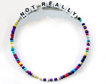 RHONY Vere casalinghe di New York / Non proprio / Luann DeLessepps / Bracciale alfabeto