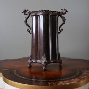 Victorian Revival Bronze Footed Vase with Dragon Handles, 11” Ornate Metal Urn, Mythological Gothic Decor, Antique Style Centerpiece Vessel