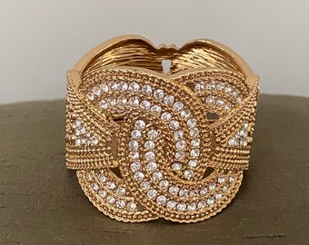 Prachtige manchetarmband - scharnierend. Nieuwe/oude voorraad-nooit gedragen-mooie kwaliteit-gekocht bij Anthropologie-Goldtone en Clear Pave steentjes