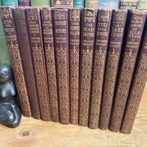 Bish Bosh Bashed Novels by Thomas Hardy Macmillan & Co. 1920-1921 editions - cloth bound, gold gilt decorated with map of Wessex