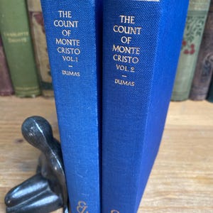 The Count of Monte Cristo, Volume I & 2, Everyman’s Library, J. M. Dent and Sons Ltd, 1955 reprint editions with dust jacket bookmark.