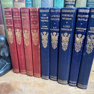 May include: A set of ten vintage hardback books with gold lettering and illustrations on the spines. The books are arranged in a row, with the spines facing the viewer. The books are all in good condition and have a classic look.