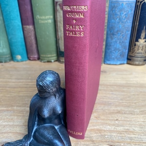 Grimm’s Fairy Tales by The Brothers Grimm, Collins, c1940, pocket book edition with colourful, full page illustrations and VG dust jacket.