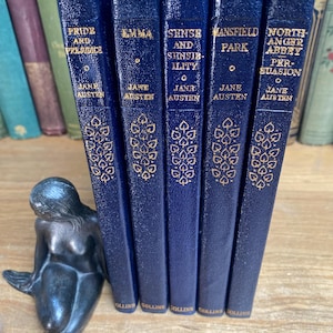 Jane Austen book set - Collins  - 1950s - navy leatherette  - gilt decorated - with Author portraits -  excellent condition.