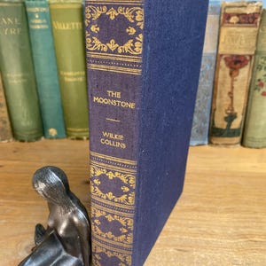 The Moonstone  - Wilkie Collins - Book League Of America - circa 1940 - dark blue cloth hardcover - gilt decorated.