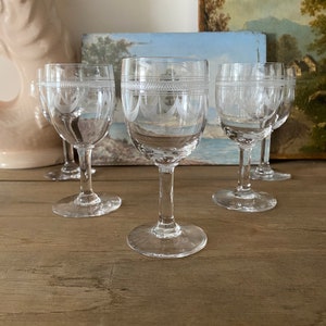 Set of 5 small antique engraved crystal glasses