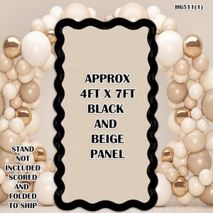 May include: A black and beige panel with the text "APPROX 4FT X 7FT BLACK AND BEIGE PANEL". The panel is surrounded by a balloon arch in shades of white, beige, and gold. The text "STAND NOT INCLUDED SCORED AND FOLDED TO SHIP" is also visible.
