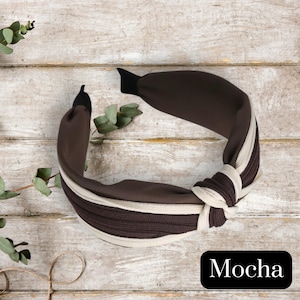 Vintage minimalist headband
Twist knot headband
Classic fabric headband
Elegant neutral headband
Chic retro-style headband
Stylish women’s hair accessory
