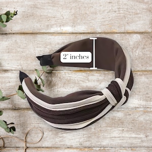 Vintage minimalist headband
Twist knot headband
Classic fabric headband
Elegant neutral headband
Chic retro-style headband
Stylish women’s hair accessory