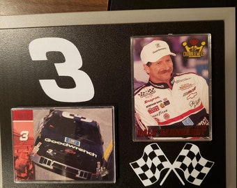 Dale Earnhardt Set of 2 NASCAR Trading Cards on a paque