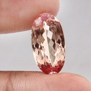 AAA Ceylon Padparadscha Sapphire: 10.50 Ct Oval Bicolor Gemstone