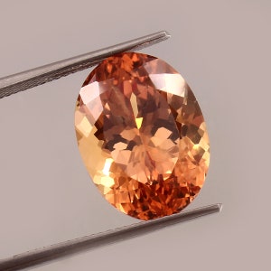 AAA Ceylon Padparadscha Sapphire: Peach Orange Oval Gemstone, 10x8 MM