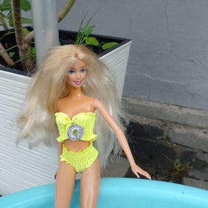 Yellow bikini for dolls about 12 inches, one sixth scale clothing