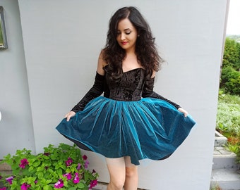 Corset dress with bare shoulders made of black velvet and blue tulle
