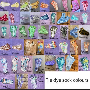 May include: A collage of 36 different tie-dye socks in various colors, including pastel yellow, red, teal, mocha, pink purple, and orange blue. The socks are arranged in a grid pattern and labeled with their corresponding colors. The text "Tie dye sock colours" is at the bottom of the image.
