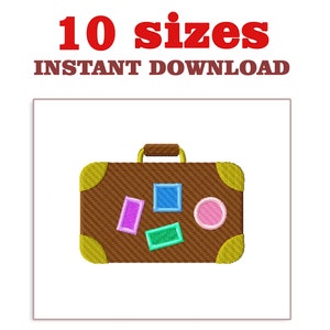 May include: Brown suitcase with a gold handle and gold accents. The suitcase has colorful stickers on it.