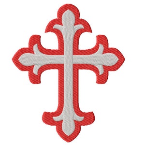 May include: A red cross with a white center, featuring a decorative, ornate design. The cross has a traditional shape with rounded edges and intricate details.