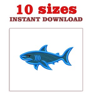 May include: A blue embroidered shark design on a white background. The shark has a detailed outline and is facing left. The text "10 sizes" and "INSTANT DOWNLOAD" is in red and brown, respectively, at the top.