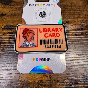Carte de bibliothèque Mme Frizzle avec prise pop pour téléphone portable ou Kindle - Bus scolaire magique
