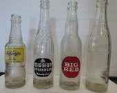 Vintage soda bottles NuGrape, Woosie, Mission and Big Red