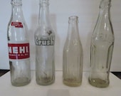 Group of 4 vintage soda bottles Sanitarr, NeHi, Crush, and Kaki Cola (Coca Cola - Saudi bottling)