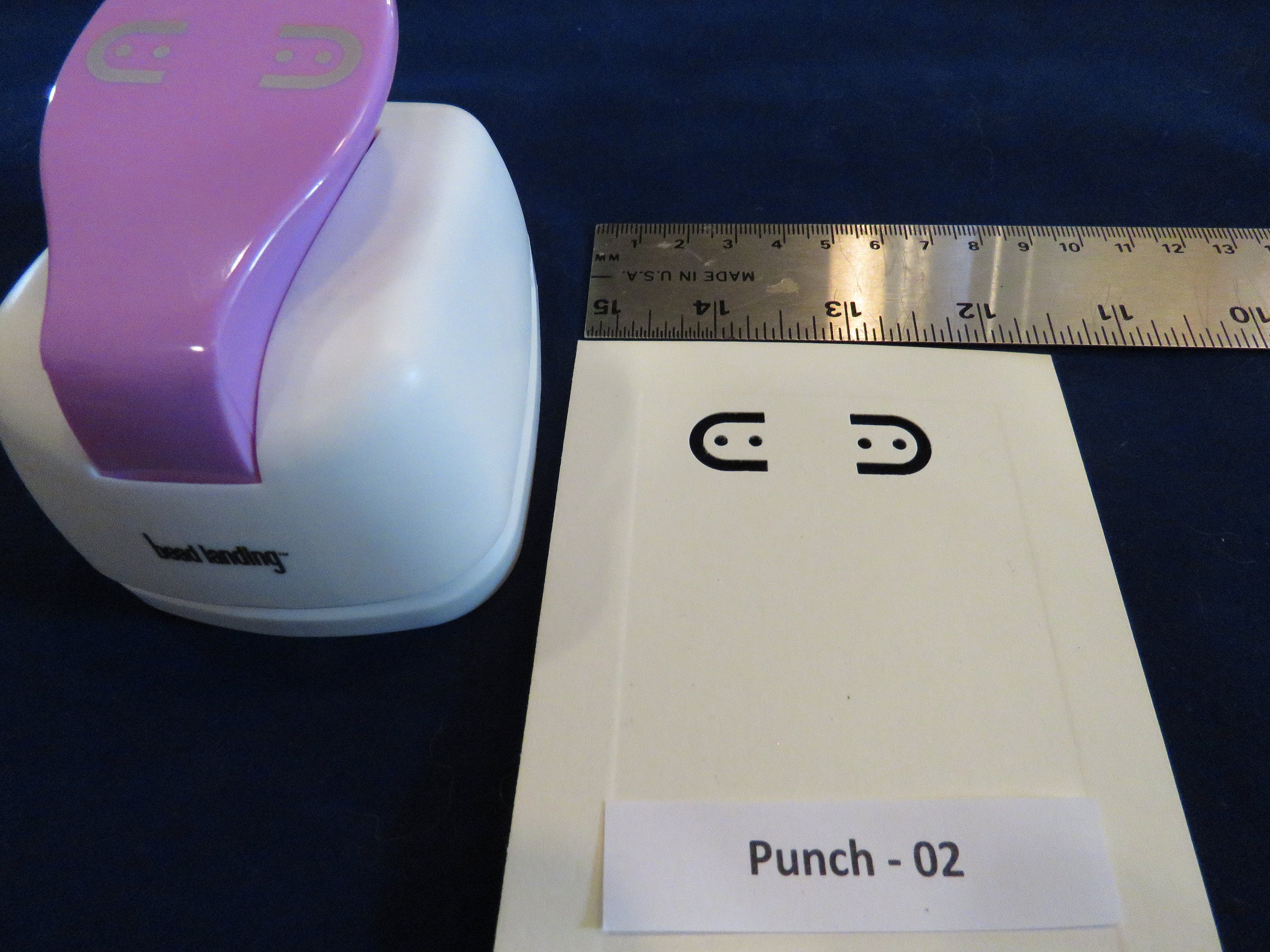 Bead landing outlet earring hole punch