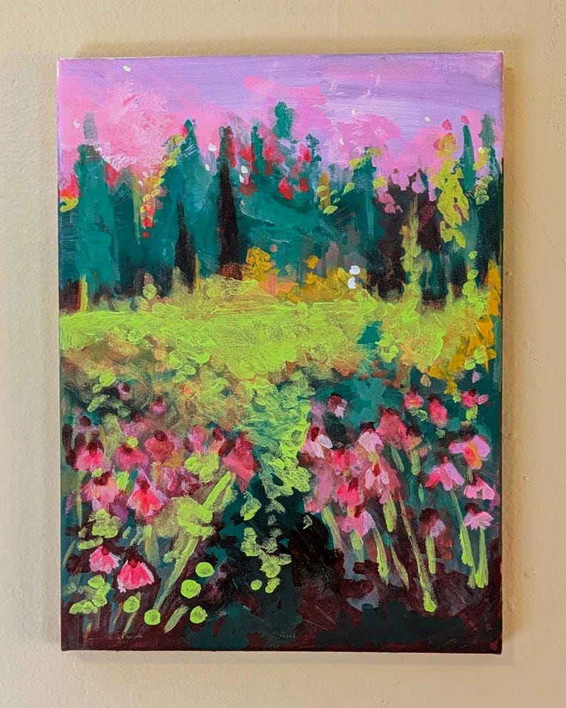 May include: An original acrylic painting on canvas showing a colourful landscape. The artwork features a field of pink flowers, a bright green meadow, and a forest of green trees under a pink and purple sky.