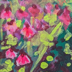 May include: An abstract painting depicting a garden scene. The artwork features vibrant pink and red flowers with green and yellow foliage against a dark green background. The brushstrokes are visible, creating a textured effect.