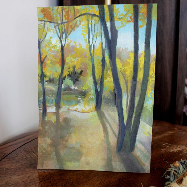 May include: A watercolor painting of a forest scene with tall trees and yellow leaves. The trees are painted in shades of blue and green, and the leaves are a bright yellow. The background is a light blue sky.