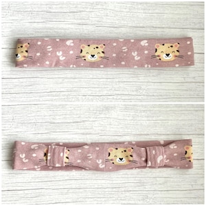 Cochlear implant/hearing aid headband for children and adults