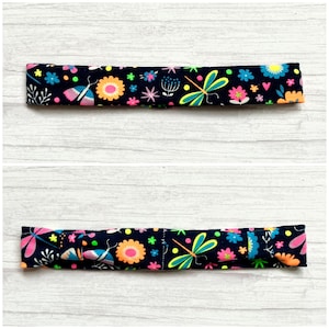 Cochlear implant/hearing aid headband for children and adults