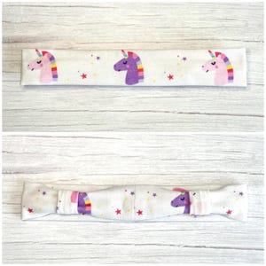 Cochlear implant/hearing aid headband for children and adults