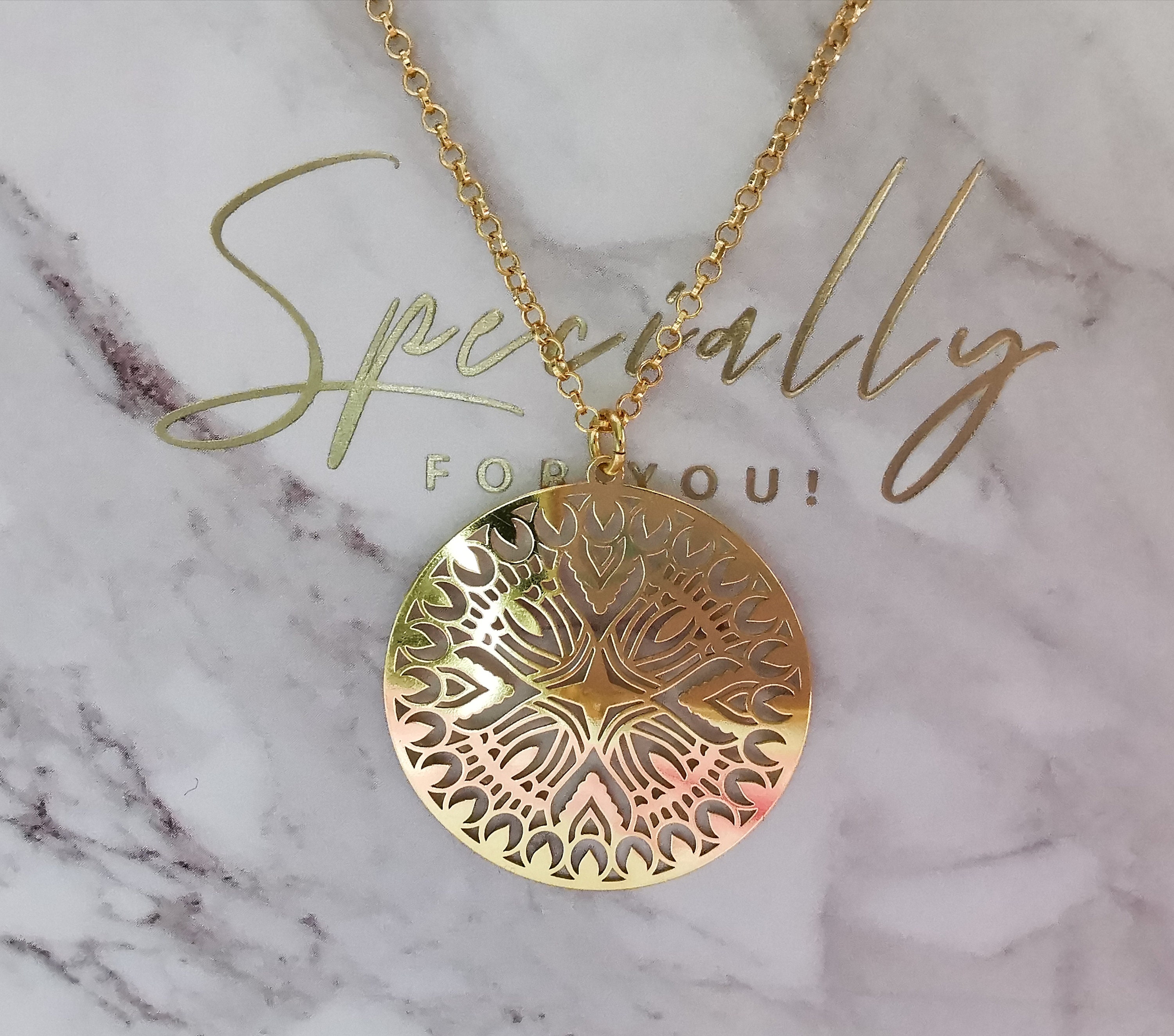 Unusual gold best sale pendants
