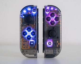 N64-Era Inspired Smoke Clear Joy-Cons with Custom LED Backlit Buttons for Nintendo Switch